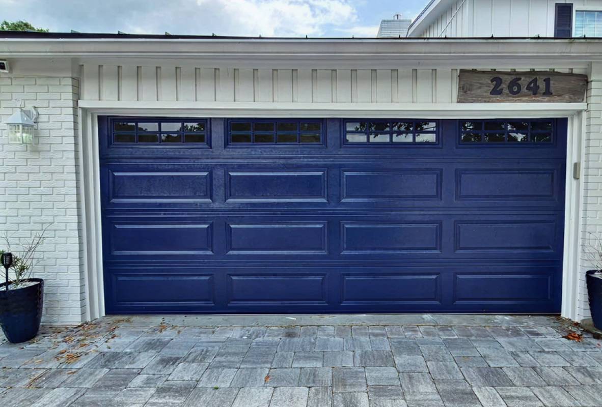 Raised panel garage door in blue