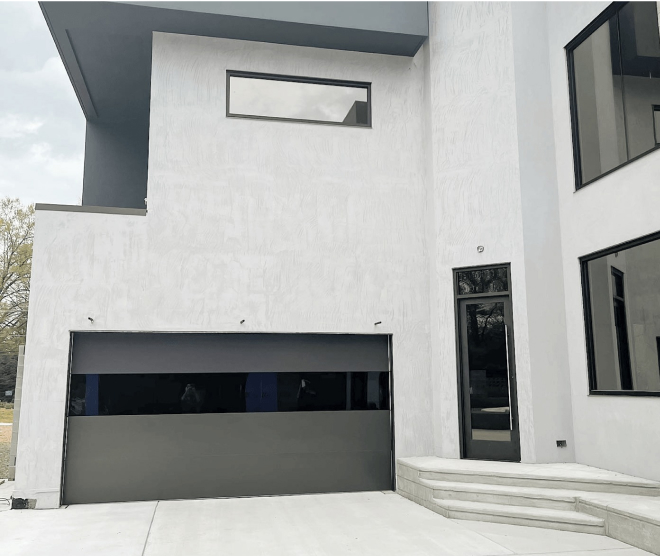 Dark gray garage door wide shot