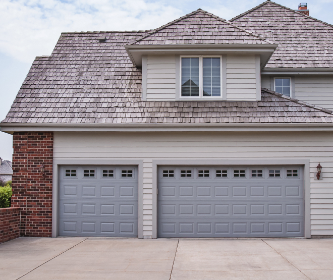 Light grey garage doors wide shot close up