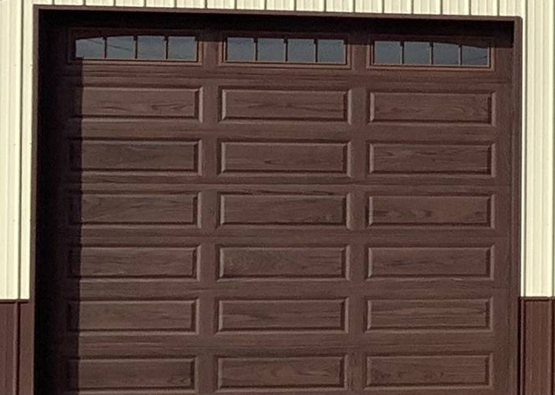 Close up of dark oak garage door